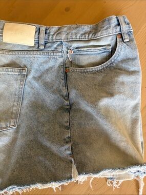 DL1961 Faded Blue Denim shorts with Frayed Hem